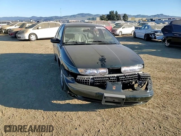 1996 Saturn SL z VIN 1G8ZK527XTZ335205, wystawiony jako Copart lot #42230735 z przebiegiem 82 344 mil mil oraz Szkoda całkowita • Salvage title. Historia ofert i sprzedaży dostępna na DreamBid. Obrazek 11.