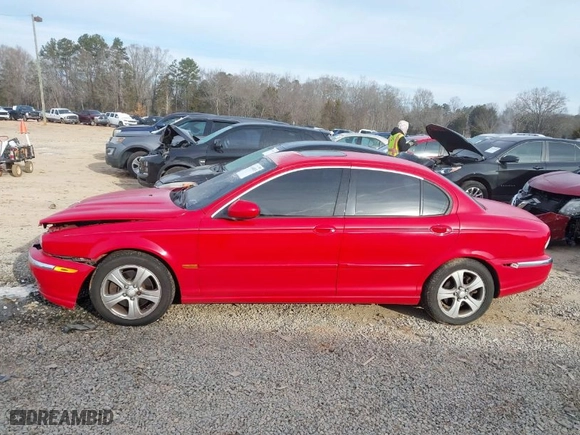 2002 Jaguar X-Type with VIN SAJEA51C22WC54063, listed as a IAAI auction lot 41404835 with NaN miles. Bid and sale history available at carsss.com. Image 14.