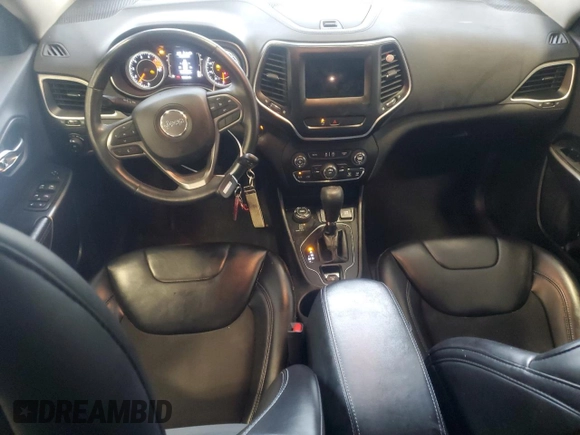 2019 Jeep Cherokee Altitude with VIN 1C4PJMLX5KD386597, listed as a Copart auction lot 59132655 with 129,243 mi miles and Salvage title. Bid and sale history available at DreamBid. Image 8.