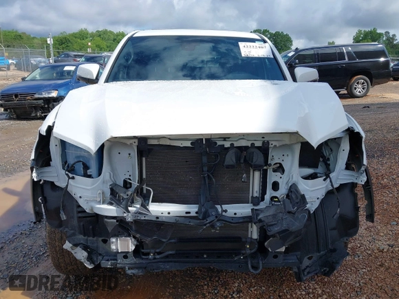 2023 Toyota Tacoma SR with VIN 3TMCZ5AN7PM639378, listed as a IAAI auction lot 42222407 with 38,172 mi miles and . Bid and sale history available at DreamBid. Image 12.