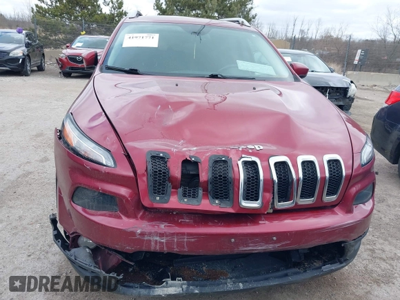 2015 Jeep Cherokee North with VIN 1C4PJMCS9FW674475, listed as a IAAI auction lot 41971771 with 186,376 mi miles. Bid and sale history available at carsss.com. Image 11.