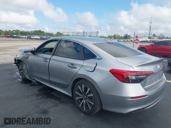 2023 Honda Civic EX z VIN 2HGFE1F79PH303727, wystawiony jako IAAI lot #42251695 z przebiegiem 21 071 mil mil oraz . Historia ofert i sprzedaży dostępna na DreamBid. Obrazek 3.