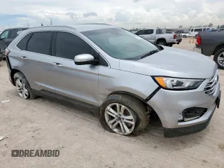 2020 Ford Edge SEL with VIN 2FMPK3J90LBA71592, listed as a Copart auction lot 62362655 with 100,040 mi miles and Salvage title. Bid and sale history available at DreamBid. Image 4.