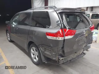 2012 Toyota Sienna LE AAS with VIN 5TDKK3DC0CS177643, listed as a IAAI auction lot 41845652 with 164,771 mi miles. Bid and sale history available at carsss.com. Image 3.