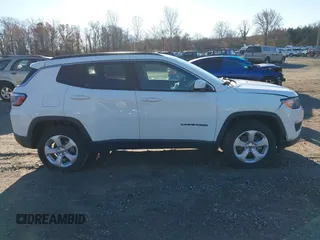 2020 Jeep Compass Latitude with VIN 3C4NJDBB2LT115599, listed as a IAAI auction lot 40970548 with 63,349 mi miles. Bid and sale history available at carsss.com. Image 13.