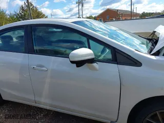 2014 Honda Civic Sedan EX-L with VIN 19XFB2F97EE049510, listed as a IAAI auction lot 40871259 with 148,424 mi miles. Bid and sale history available at carsss.com. Image 13.