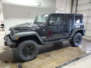 2009 Jeep Wrangler Unlimited Rubicon with VIN 1J8GA69179L756441, listed as a Copart auction lot 52111435 with 157,818 mi miles and Salvage title. Bid and sale history available at DreamBid. Image 1.