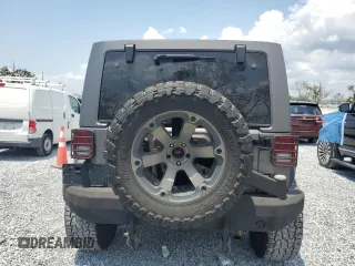 2012 Jeep Wrangler Unlimited Altitude with VIN 1C4HJWEG6CL209870, listed as a Copart auction lot 56490065 with 155,395 mi miles and Clean title. Bid and sale history available at DreamBid. Image 6.