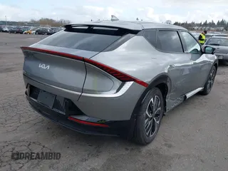2023 Kia EV6 Wind with VIN KNDC3DLC7P5114527, listed as a IAAI auction lot 41665100 with 8,313 mi miles and . Bid and sale history available at DreamBid. Image 4.