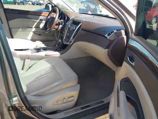 2012 Cadillac SRX Performance Collection with VIN 3GYFNBE3XCS565616, listed as a IAAI auction lot 41835476 with 141,259 mi miles. Bid and sale history available at carsss.com. Image 5.