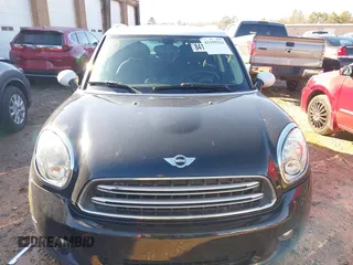 2015 MINI Countryman with VIN WMWZB3C59FWR44862, listed as a IAAI auction lot 41199254 with 94,074 mi miles and . Bid and sale history available at DreamBid. Image 12.