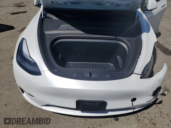 2024 Tesla Model Y Long Range с VIN 7SAYGDEE6RF157415, выставлен на аукционе Copart как лот 54950915 с пробегом 20 567 миль миль и Списание • Salvage title. История ставок и продаж доступна на DreamBid. Изображение 11.
