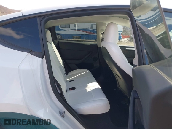 2024 Tesla Model Y with VIN 7SAYGDED2RF089010, listed as a IAAI auction lot 41630222 with 18,366 mi miles and . Bid and sale history available at carsss.com. Image 8.