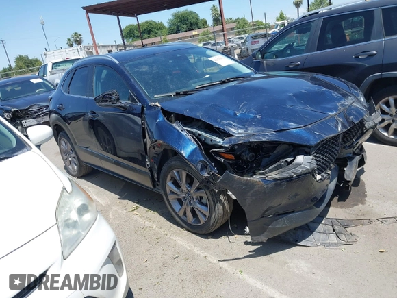 2023 Mazda CX-30 S Select with VIN 3MVDMBBM3PM514030, listed as a IAAI auction lot 42326959 with 41,226 mi miles and . Bid and sale history available at DreamBid. Image 1.