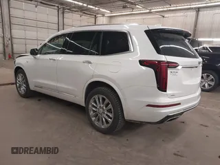 2022 Cadillac XT6 Premium Luxury with VIN 1GYKPDRS3NZ131095, listed as a IAAI auction lot 42087620 with 36,740 mi miles and . Bid and sale history available at DreamBid. Image 3.