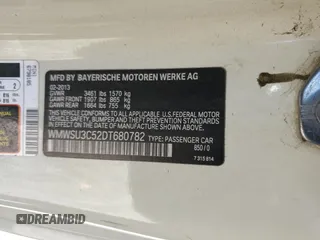 2013 MINI Hardtop with VIN WMWSU3C52DT680782, listed as a Copart auction lot 61779515 with 94,378 mi miles and Salvage title. Bid and sale history available at DreamBid. Image 12.