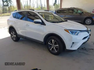 2018 Toyota RAV4 XLE with VIN JTMRFREVXJD240388, listed as a IAAI auction lot 42052065 with 117,114 mi miles. Bid and sale history available at carsss.com. Image 1.
