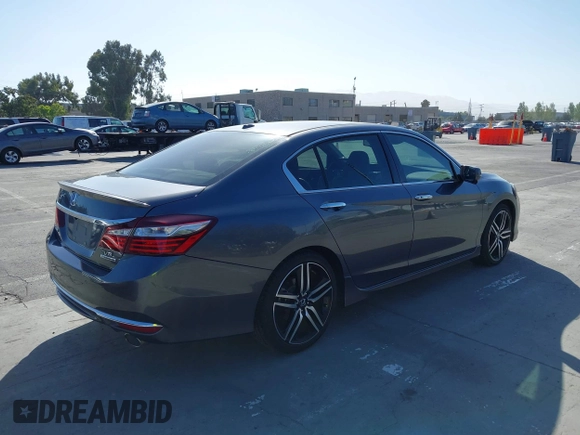 2017 Honda Accord Touring with VIN 1HGCR3F97HA030310, listed as a IAAI auction lot 42539852 with 64,849 mi miles and . Bid and sale history available at DreamBid. Image 4.