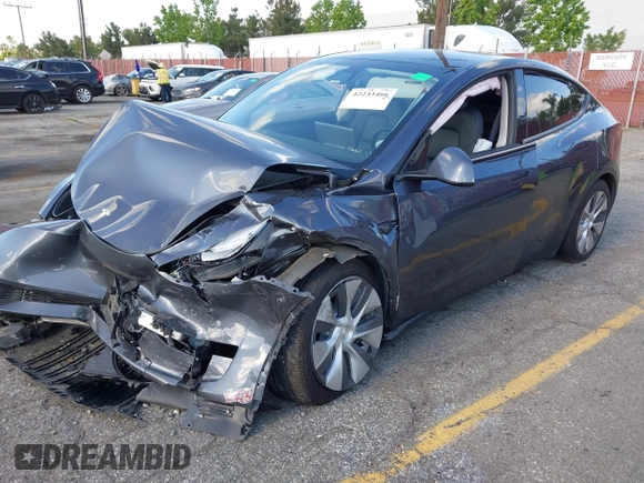 2023 Tesla Model Y Long Range with VIN 7SAYGDEE7PA192488, listed as a IAAI auction lot 42233466 with Not provided miles and . Bid and sale history available at DreamBid. Image 2.