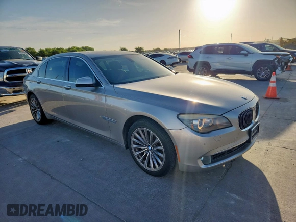 2012 BMW 7 Series 740Li with VIN WBAKB4C59CC576610, listed as a Copart auction lot 62762465 with 128,073 mi miles and Clean title. Bid and sale history available at DreamBid. Image 4.