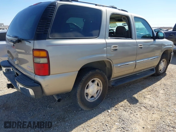 2003 GMC Yukon SLT with VIN 1GKEC13V33R298333, listed as a IAAI auction lot 41582447 with 166,047 mi miles. Bid and sale history available at carsss.com. Image 4.
