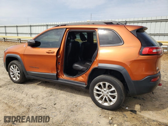 2015 Jeep Cherokee Trailhawk with VIN 1C4PJMBB5FW600455, listed as a Copart auction lot 53859365 with 164,420 mi miles and Salvage Title. Bid and sale history available at DreamBid. Image 2.