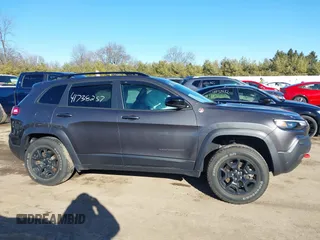 2022 Jeep Cherokee Trailhawk with VIN 1C4PJMBX9ND522235, listed as a IAAI auction lot 41738257 with 24,911 mi miles and . Bid and sale history available at DreamBid. Image 14.