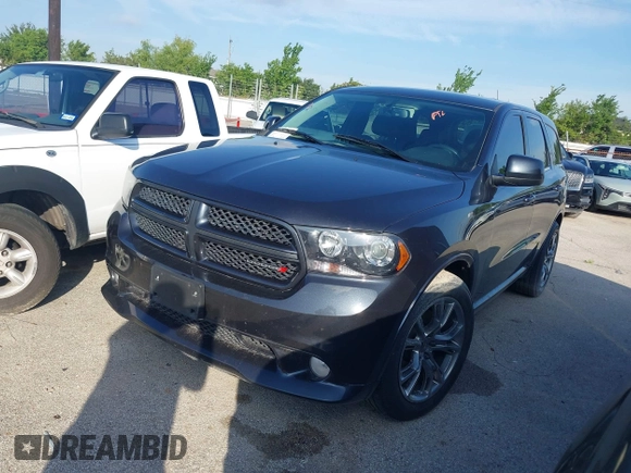 2013 Dodge Durango R/T with VIN 1C4SDHCT6DC658802, listed as a IAAI auction lot 42510985 with 67,653 mi miles and . Bid and sale history available at DreamBid. Image 2.
