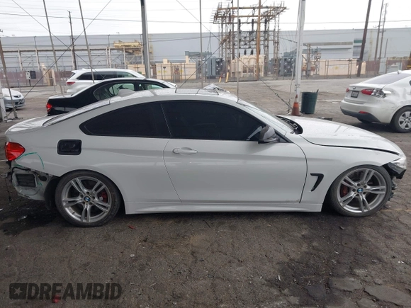 2016 BMW 4 Series 428i with VIN WBA3N7C54GK227752, listed as a IAAI auction lot 42003116 with 127,085 mi miles and . Bid and sale history available at DreamBid. Image 14.