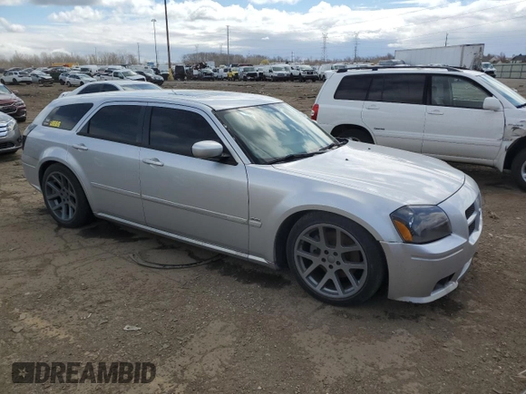 2005 Dodge Magnum RT z VIN 2D8GV582X5H585242, wystawiony jako Copart lot #52991445 z przebiegiem 170 968 mil mil oraz Czysty tytuł • Clean title. Historia ofert i sprzedaży dostępna na DreamBid. Obrazek 4.