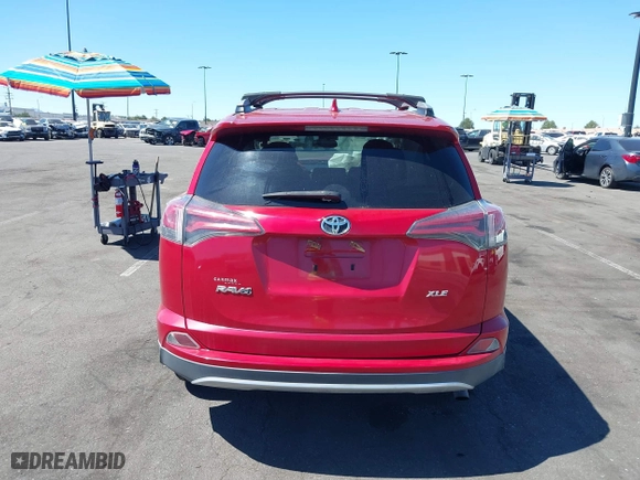 2016 Toyota RAV4 XLE with VIN 2T3WFREV3GW239632, listed as a IAAI auction lot 41860727 with 135,850 mi miles. Bid and sale history available at carsss.com. Image 16.