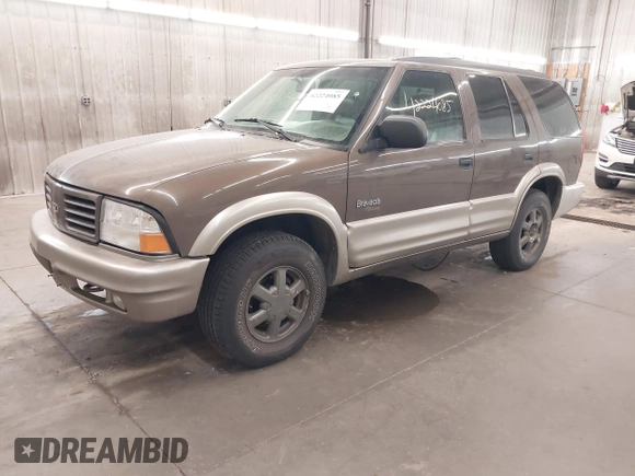 2001 Oldsmobile Bravada z VIN 1GHDT13W812133670, wystawiony jako IAAI lot #42224085 z przebiegiem 159 995 mil mil oraz . Historia ofert i sprzedaży dostępna na DreamBid. Obrazek 2.