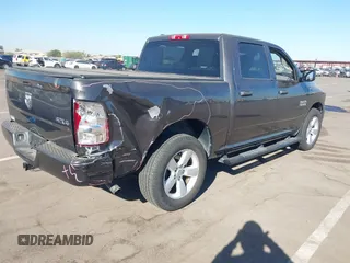 2015 Ram 1500 Tradesman with VIN 1C6RR7KG1FS769305, listed as a IAAI auction lot 41337285 with 97,052 mi miles and . Bid and sale history available at DreamBid. Image 4.