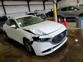 2019 Mazda 3 z VIN 3MZBPABL4KM114291, wystawiony jako Copart lot #57652945 z przebiegiem 148 644 mil mil oraz Szkoda całkowita • Salvage title. Historia ofert i sprzedaży dostępna na DreamBid. Obrazek 14.
