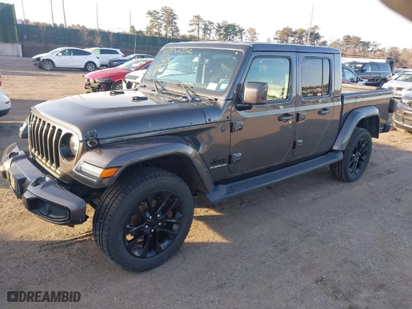 2021 Jeep Gladiator Overland with VIN 1C6HJTFG3ML565828, listed as a IAAI auction lot 41592507 with 43,607 mi miles. Bid and sale history available at carsss.com. Image 2.