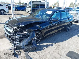 2021 BMW 3 Series 330i with VIN 3MW5R1J00M8B85692, listed as a IAAI auction lot 41824283 with 21,040 mi miles. Bid and sale history available at carsss.com. Image 2.