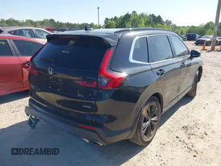 2023 Honda CR-V Sport Touring with VIN 2HKRS6H97PH804042, listed as a IAAI auction lot 42041207 with 19,152 mi miles and . Bid and sale history available at DreamBid. Image 4.