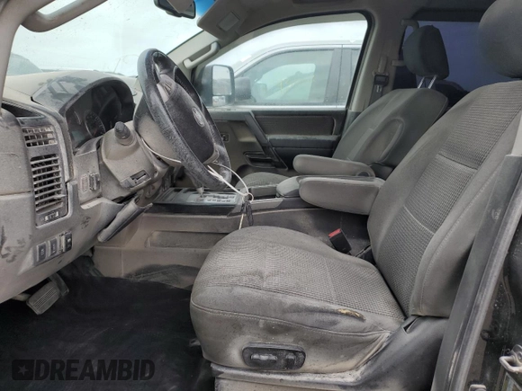 2013 Nissan Titan S with VIN 1N6AA0EC1DN302813, listed as a Copart auction lot 76369234 with 103,304 mi miles and Salvage Title. Bid and sale history available at DreamBid. Image 7.