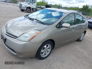 2007 Toyota Prius z VIN JTDKB20U573212497, wystawiony jako IAAI lot #42337219 z przebiegiem 198 984 mil mil oraz . Historia ofert i sprzedaży dostępna na DreamBid. Obrazek 2.