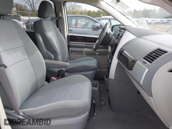 2010 Dodge Grand Caravan SXT with VIN 2D4RN5D18AR218903, listed as a IAAI auction lot 41560484 with Not Provided miles and . Bid and sale history available at DreamBid. Image 5.