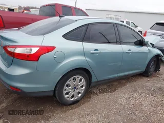 2012 Ford Focus SE with VIN 1FAHP3F2XCL470215, listed as a IAAI auction lot 41094147 with 139,653 mi miles and . Bid and sale history available at DreamBid. Image 14.