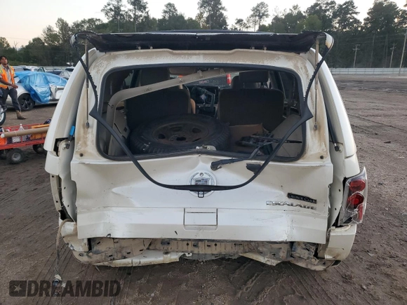 2003 Cadillac Escalade z VIN 1GYEC63T63R139405, wystawiony jako Copart lot #88884095 z przebiegiem Nie podano mil oraz Szkoda całkowita • Salvage title. Historia ofert i sprzedaży dostępna na DreamBid. Obrazek 6.