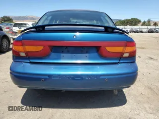 2000 Saturn SL with VIN 1G8ZK5271YZ184701, listed as a Copart auction lot 61598135 with 123,309 mi miles and Salvage title. Bid and sale history available at DreamBid. Image 6.