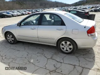 2009 Kia Spectra EX with VIN KNAFE221195655309, listed as a Copart auction lot 46620985 with 105,607 mi miles and Salvage Title. Bid and sale history available at DreamBid. Image 2.