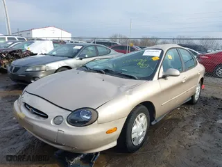 1999 Ford Taurus SE with VIN 1FAFP53U3XA131984, listed as a IAAI auction lot 41638566 with 84,836 mi miles. Bid and sale history available at carsss.com. Image 17.