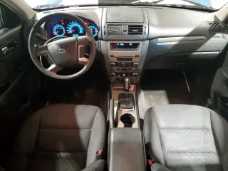 2010 Ford Fusion SE with VIN 3FAHP0HA5AR297821, listed as a Copart auction lot 47209345 with 153,668 mi miles and Salvage Title. Bid and sale history available at DreamBid. Image 8.