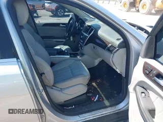 2014 Mercedes-Benz GL 450 z VIN 4JGDF7CE4EA347876, wystawiony jako IAAI lot #42386949 z przebiegiem 133 400 mil mil oraz . Historia ofert i sprzedaży dostępna na DreamBid. Obrazek 5.