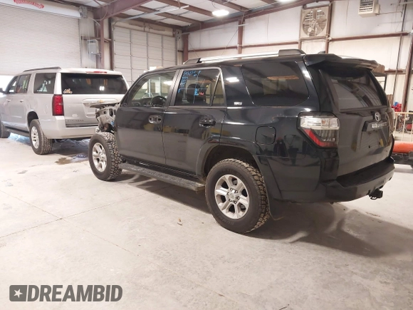 2021 Toyota 4Runner SR5 with VIN JTEMU5JR4M5939432, listed as a IAAI auction lot 41421383 with 102,699 mi miles and . Bid and sale history available at DreamBid. Image 3.
