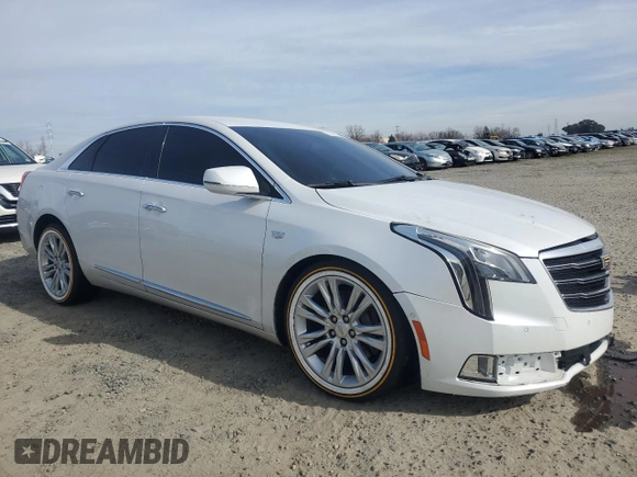 2019 Cadillac XTS Luxury with VIN 2G61M5S3XK9119389, listed as a Copart auction lot 45212585 with 106,566 mi miles and Salvage Title. Bid and sale history available at DreamBid. Image 4.