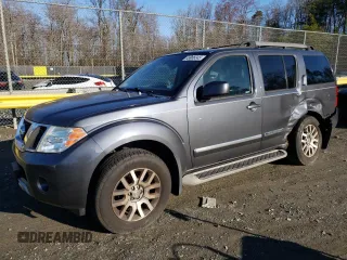 2011 Nissan Pathfinder LE z VIN 5N1AR1NB7BC628807, wystawiony jako Copart lot #49986345 z przebiegiem 246 410 mil mil oraz Szkoda całkowita • Salvage title. Historia ofert i sprzedaży dostępna na DreamBid. Obrazek 1.